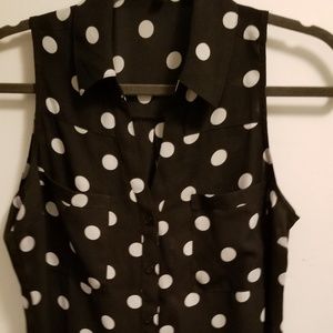Sleeveless polka dotted blouse